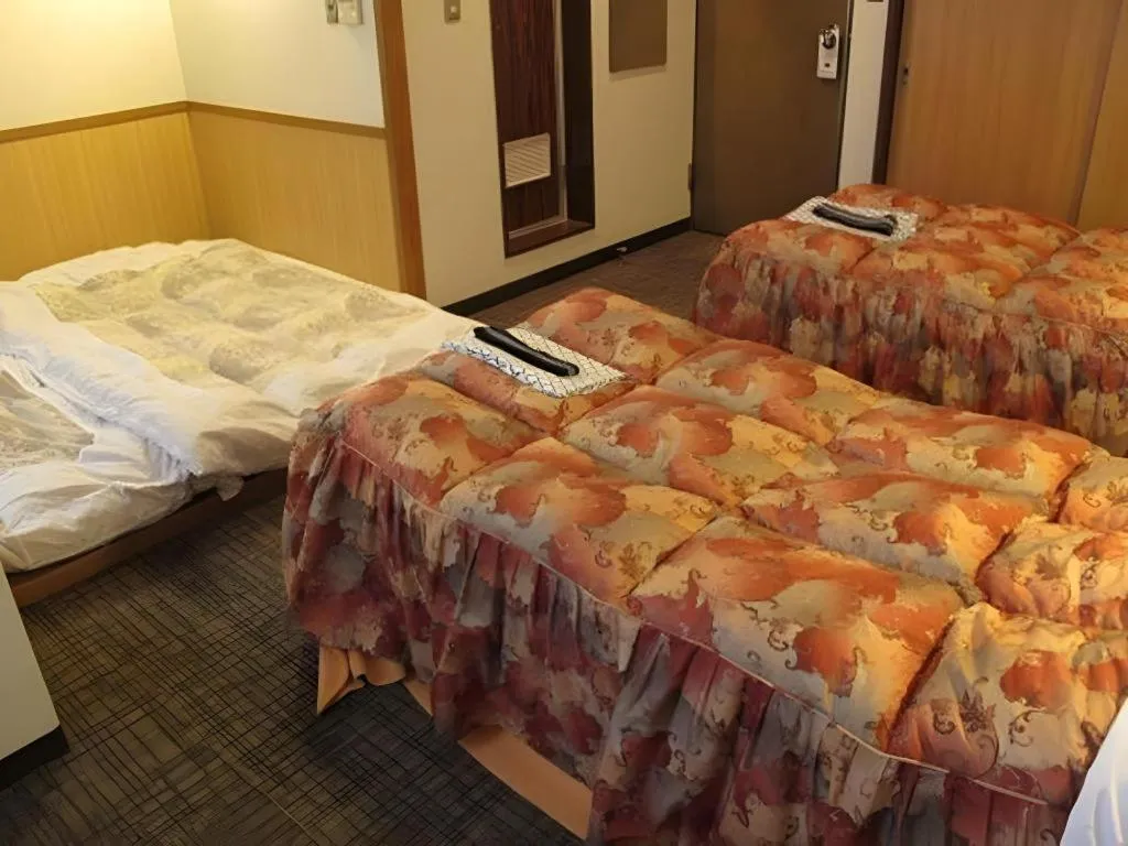 Bed in Mimatsu Hotel