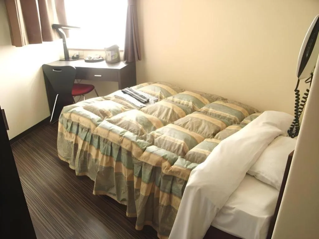 Bed in Mimatsu Hotel