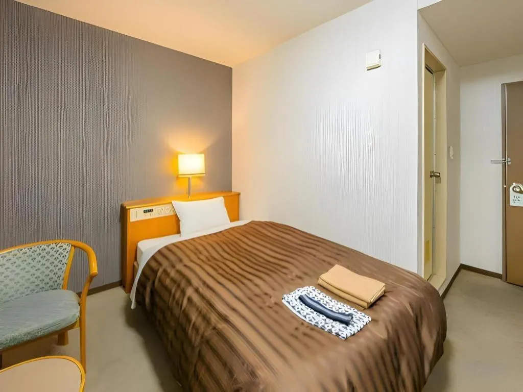 Bed in Mimatsu Hotel