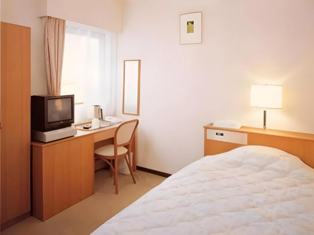 Bed in Mimatsu Hotel