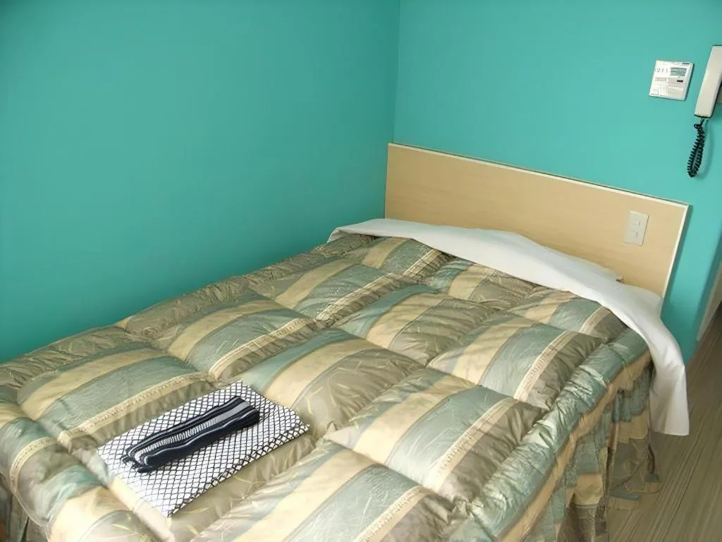 Bed in Mimatsu Hotel