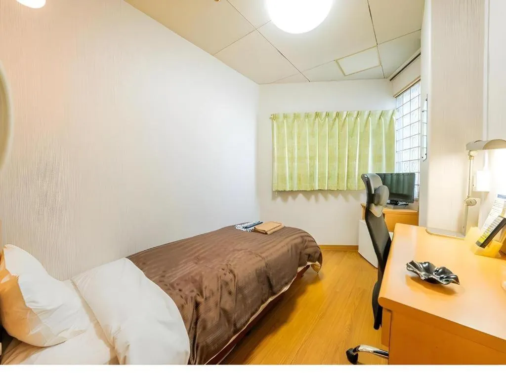 Bed in Mimatsu Hotel