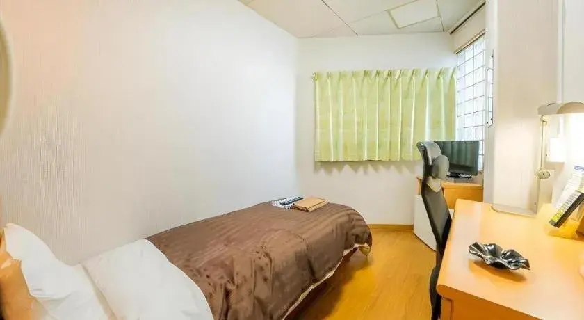 Bed in Mimatsu Hotel Bed in Mimatsu Hotel