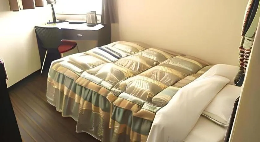 Bed in Mimatsu Hotel