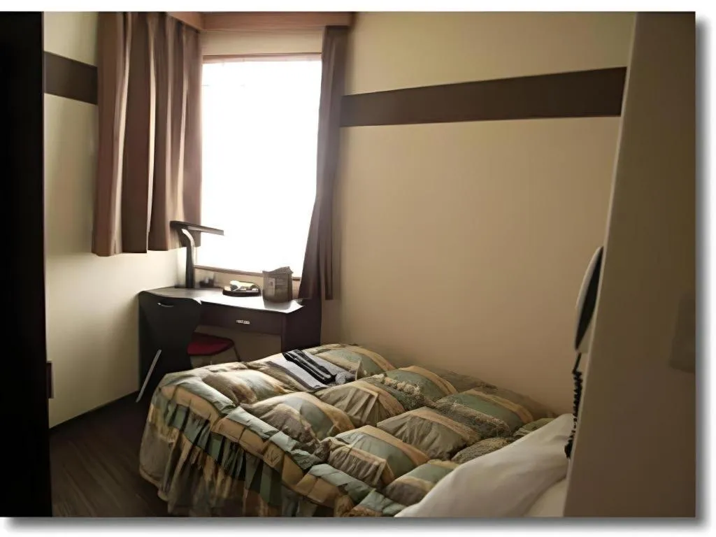 Bed in Mimatsu Hotel