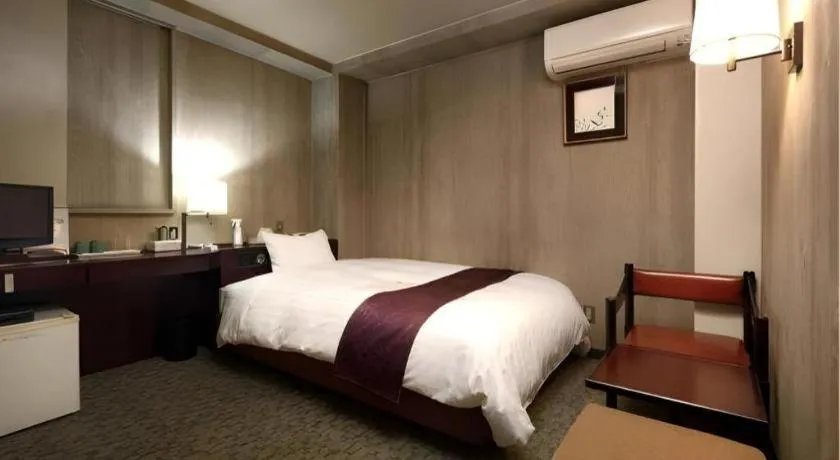 Bed in Ueda Plaza Hotel