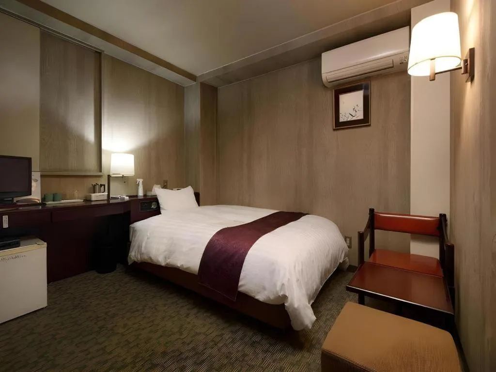 Bed in Ueda Plaza Hotel