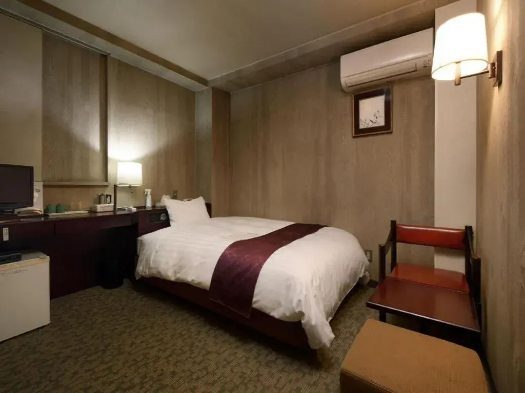 Bed in Ueda Plaza Hotel Bed in Ueda Plaza Hotel