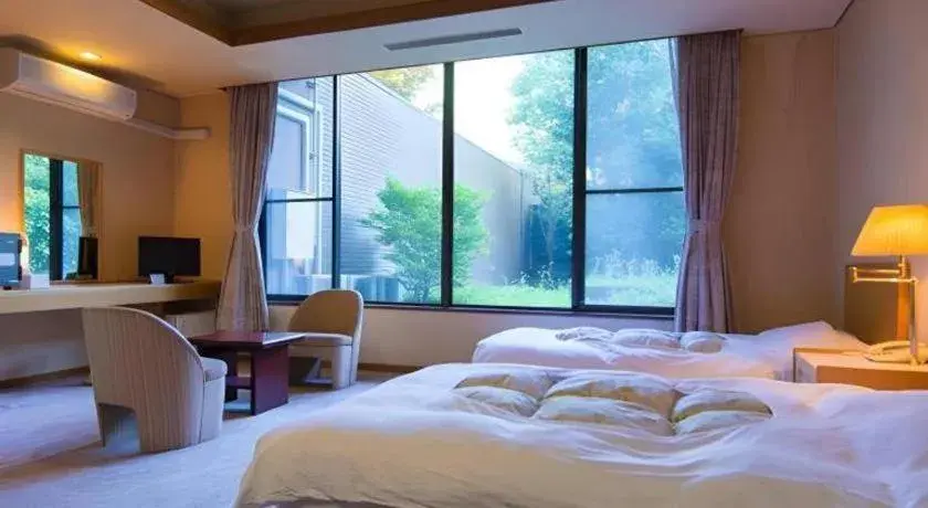 Bed in Yufuin Onsen Yufuin Nanairo no Kaze Bed in Yufuin Onsen Yufuin Nanairo no Kaze