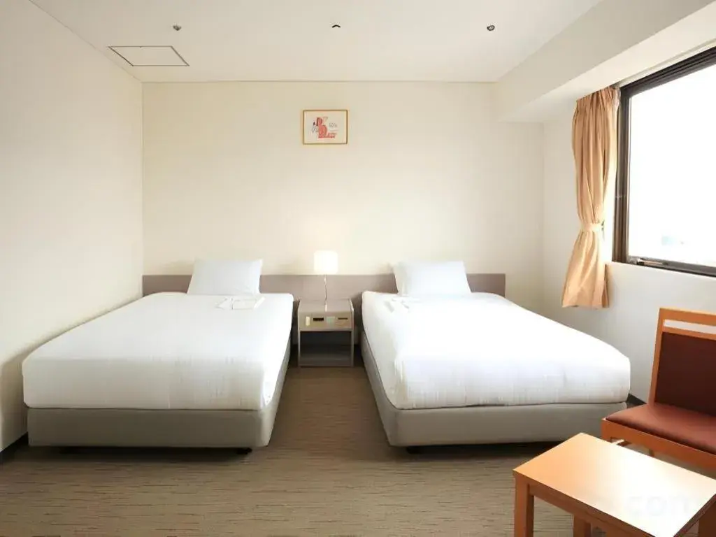 Bed in Smile Hotel Hirosaki Bed in Smile Hotel Hirosaki