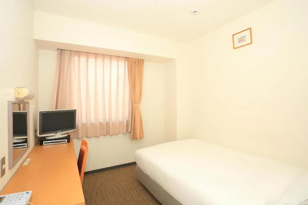 Bed in Smile Hotel Hirosaki
