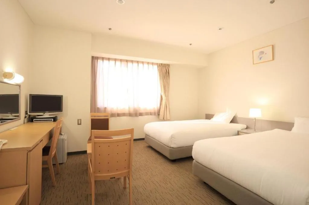 Bed in Smile Hotel Hirosaki