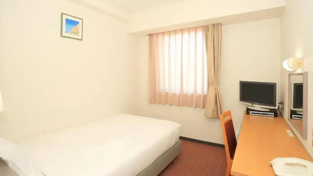 Bed in Smile Hotel Hirosaki Bed in Smile Hotel Hirosaki