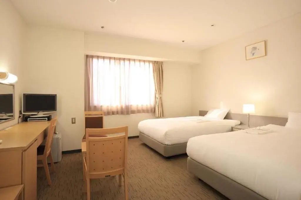 Bed in Smile Hotel Hirosaki Bed in Smile Hotel Hirosaki