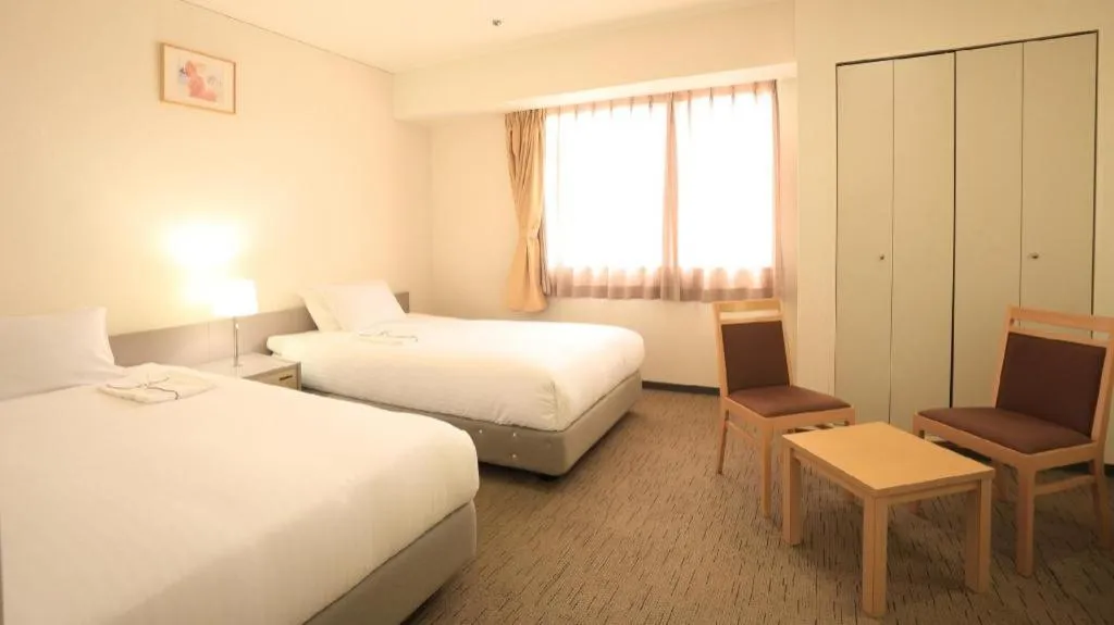 Bed in Smile Hotel Hirosaki