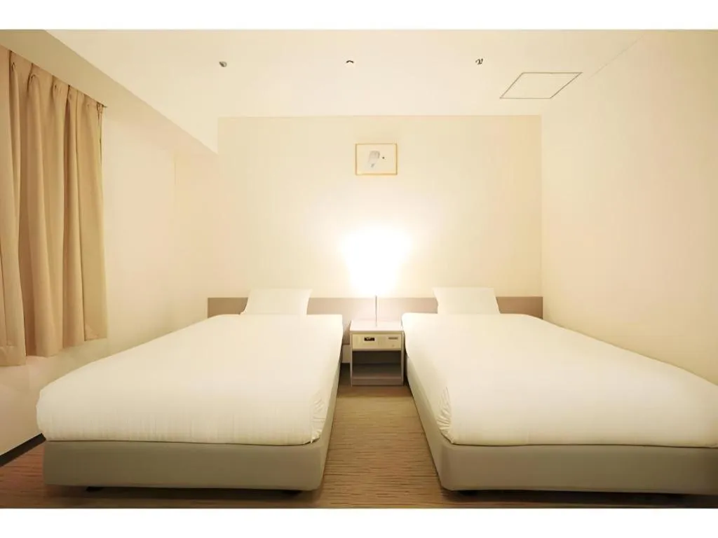 Bed in Smile Hotel Hirosaki