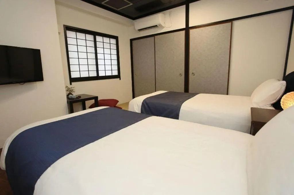 Bed in Rozy Hotel Namba