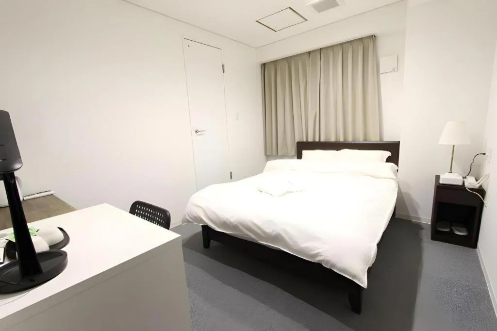 Bed in Rozy Hotel Namba