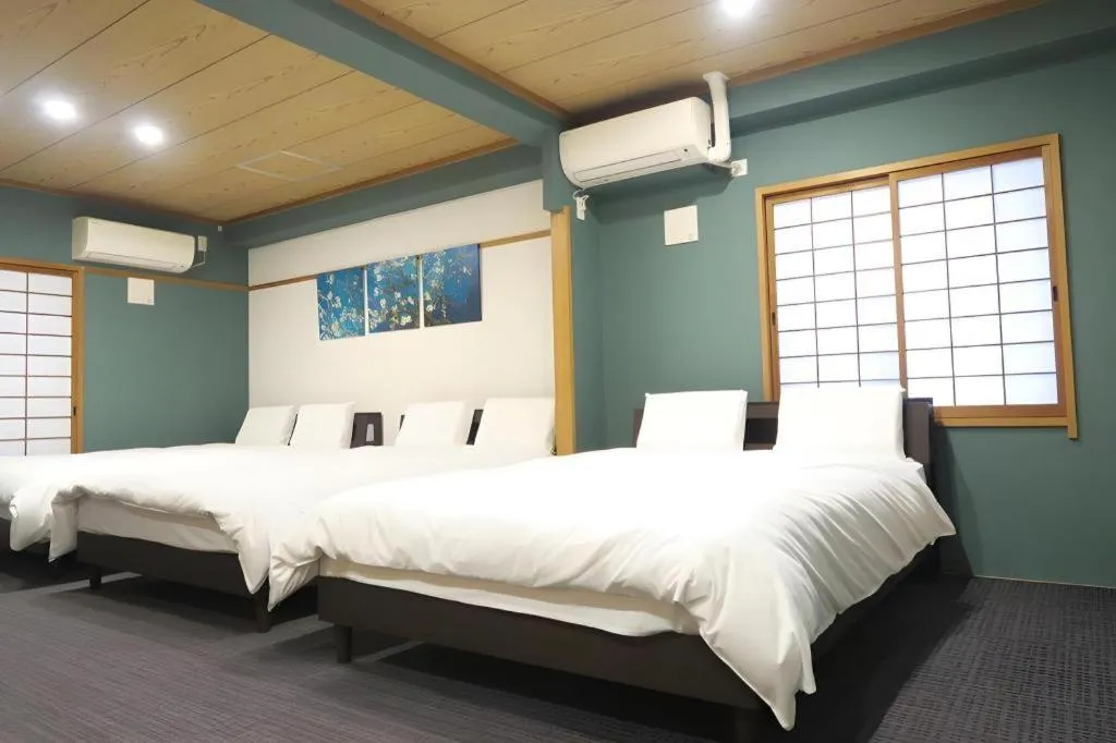 Bed in Rozy Hotel Namba
