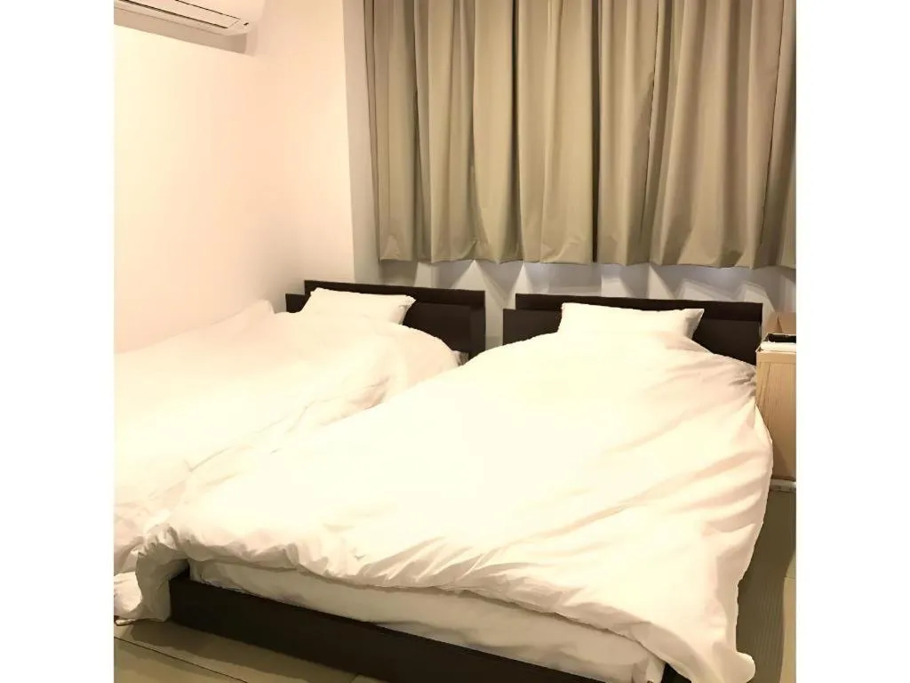 Bed in Rozy Hotel Namba