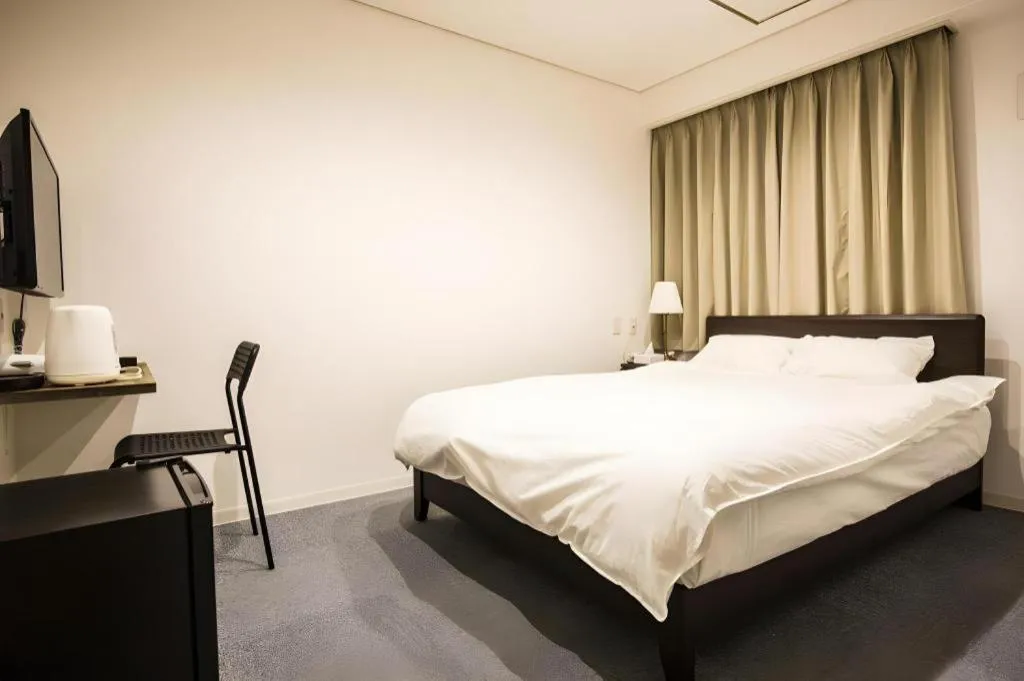Bed in Rozy Hotel Namba
