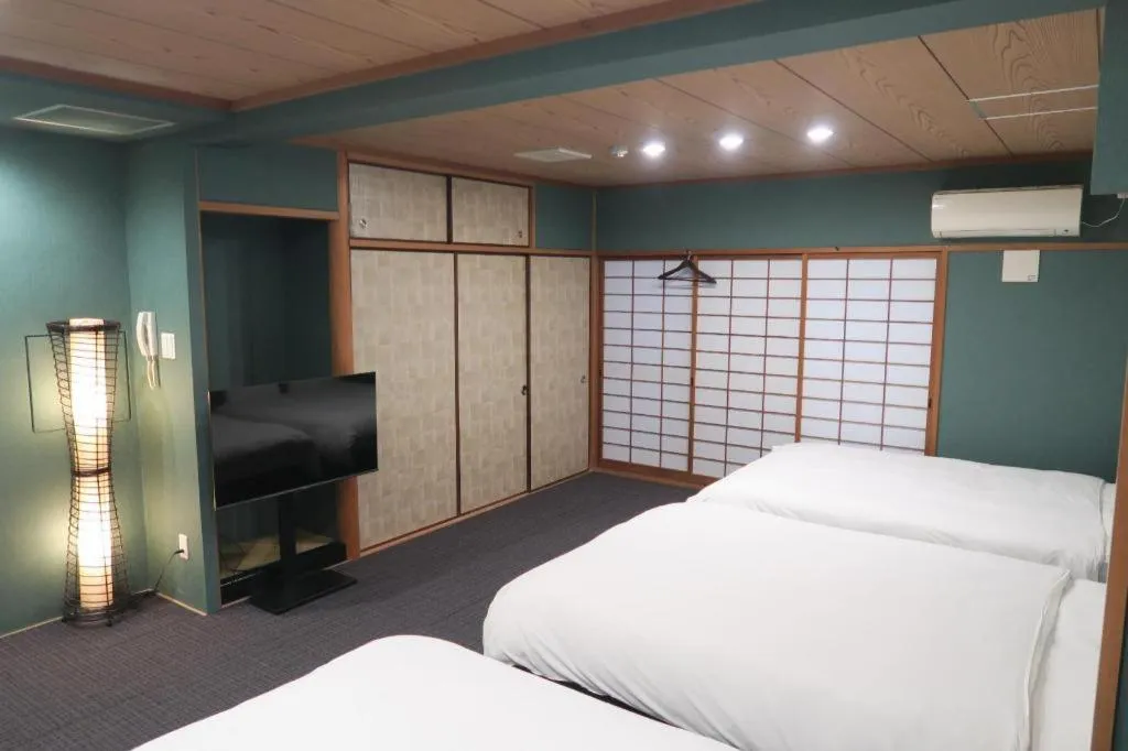 Bed in Rozy Hotel Namba
