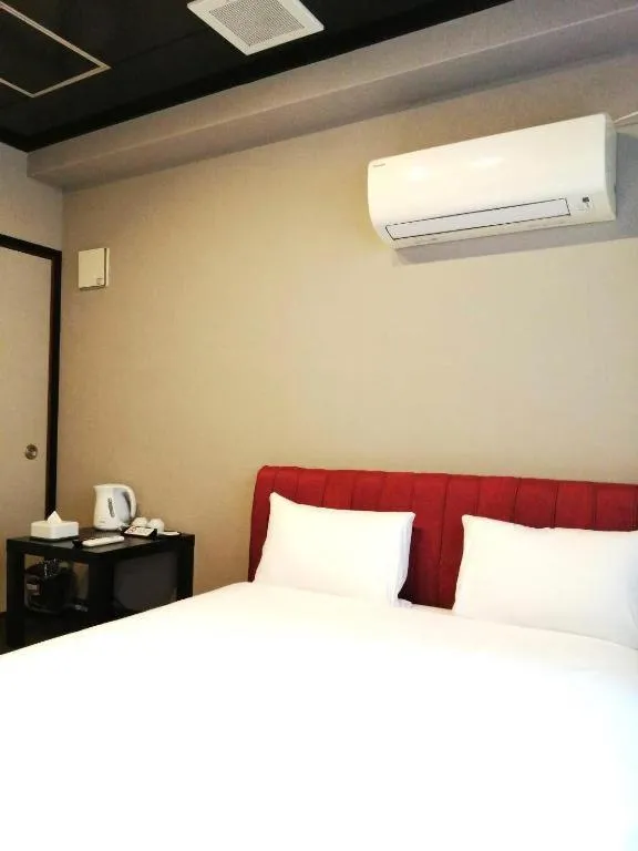 Bed in Rozy Hotel Namba