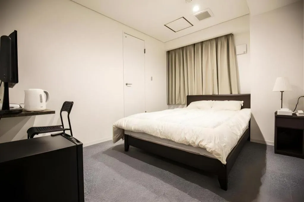Bed in Rozy Hotel Namba