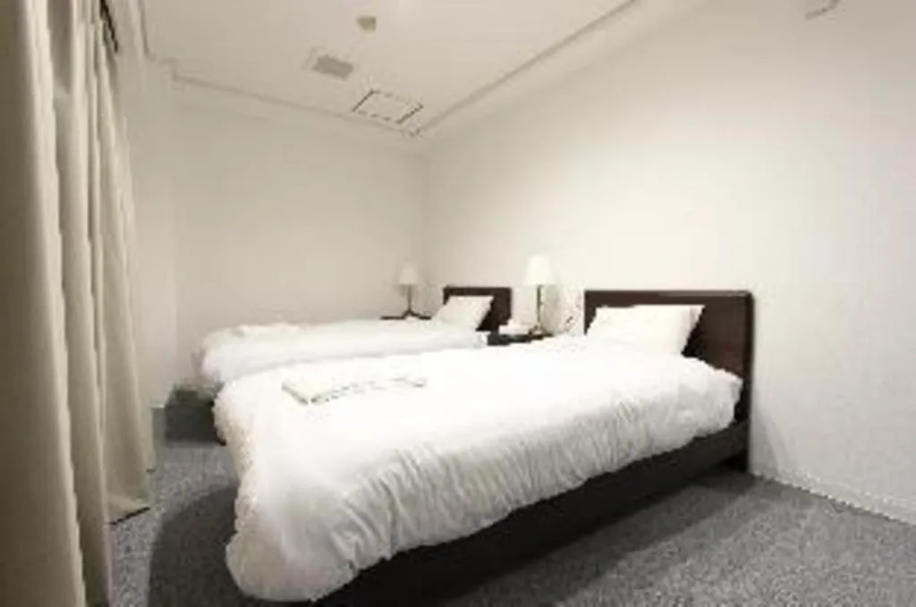 Bed in Rozy Hotel Namba