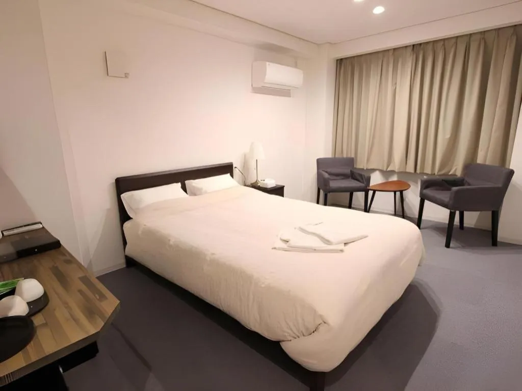 Bed in Rozy Hotel Namba