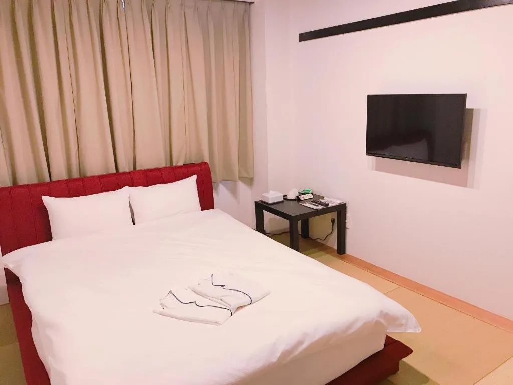 Bed in Rozy Hotel Namba