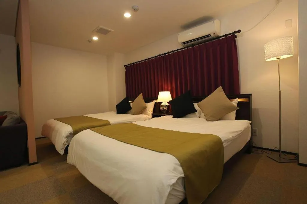 Bed in Rozy Hotel Namba