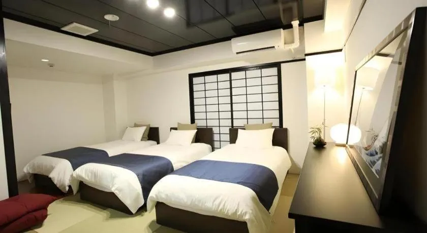 Bed in Rozy Hotel Namba