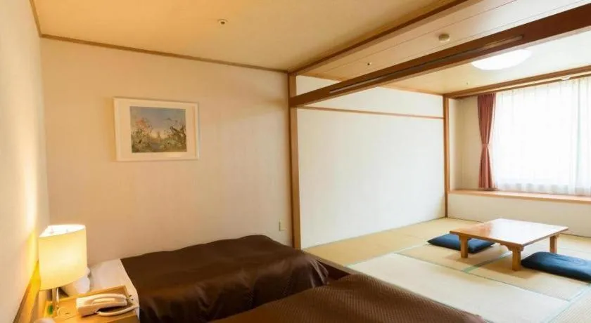 Bed in Washigatake Kogen Hotel Rainbow