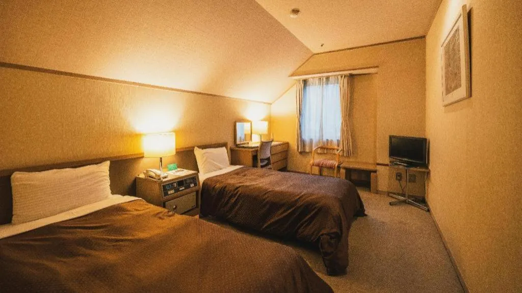 Bed in Washigatake Kogen Hotel Rainbow