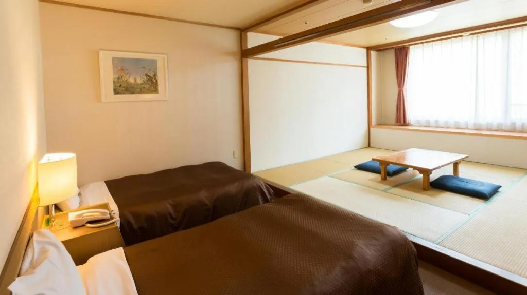 Bed in Washigatake Kogen Hotel Rainbow