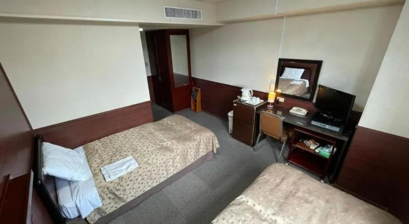 Bed in Fuji Park Hotel