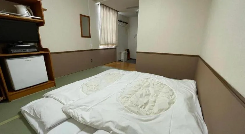 Bed in Fuji Park Hotel