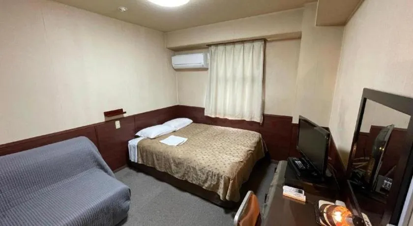 Bed in Fuji Park Hotel