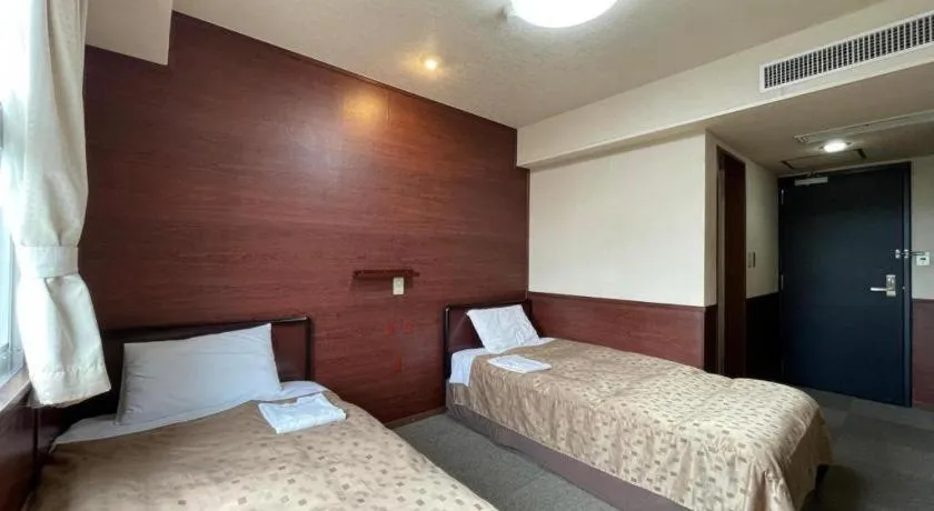 Bed in Fuji Park Hotel