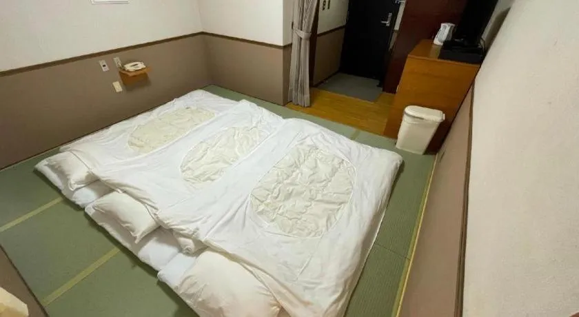 Bed in Fuji Park Hotel