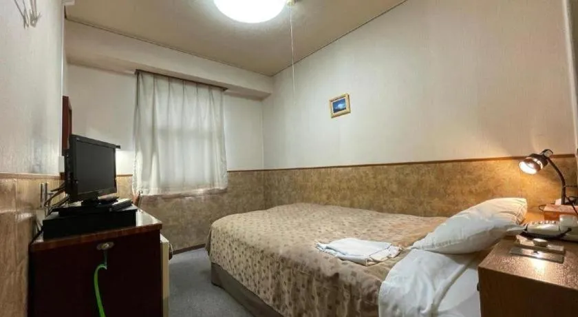 Bed in Fuji Park Hotel