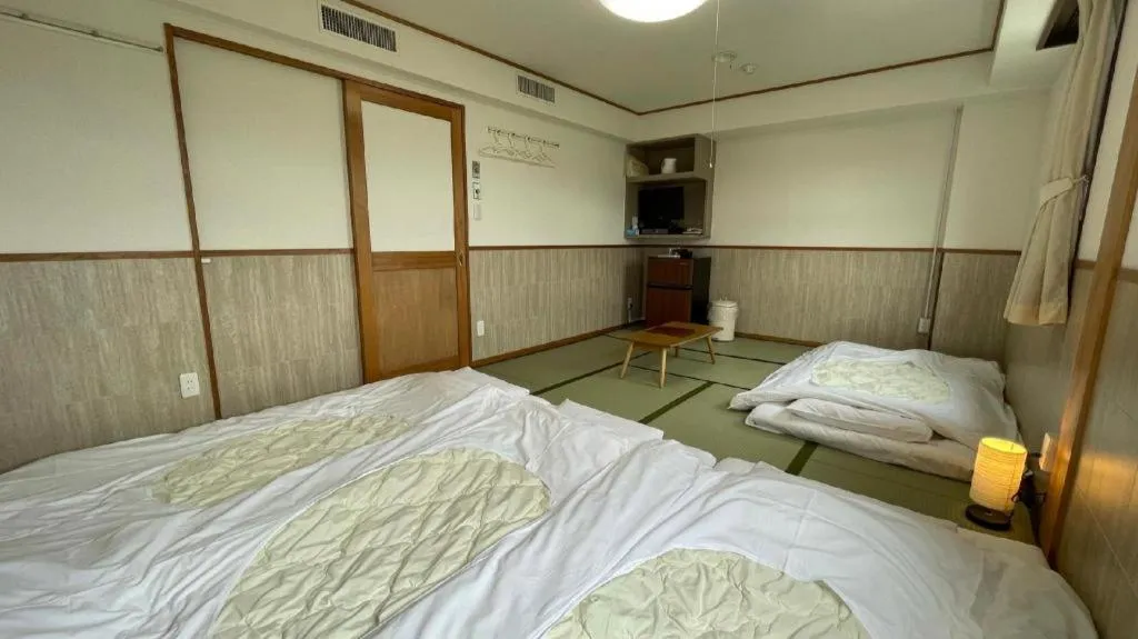 Bed in Fuji Park Hotel