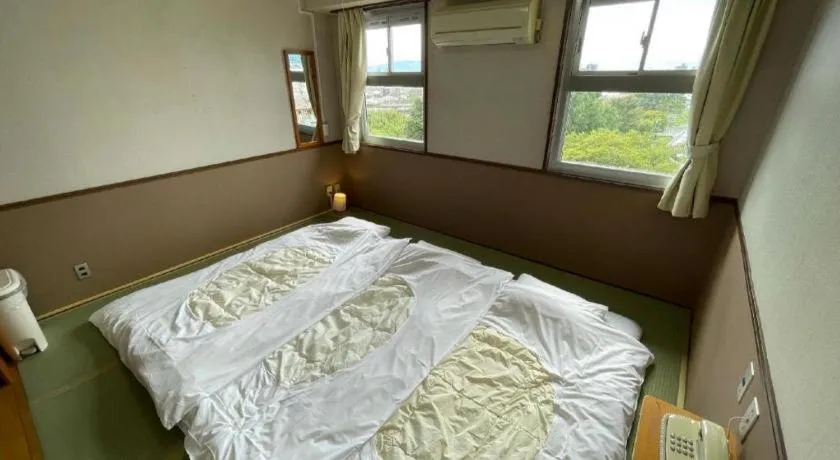 Bed in Fuji Park Hotel