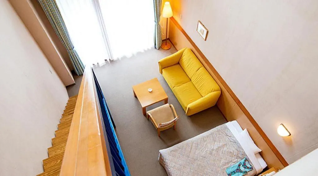 Bed in Sea Side Villa Bokkai