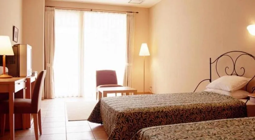 Bed in Sea Side Villa Bokkai