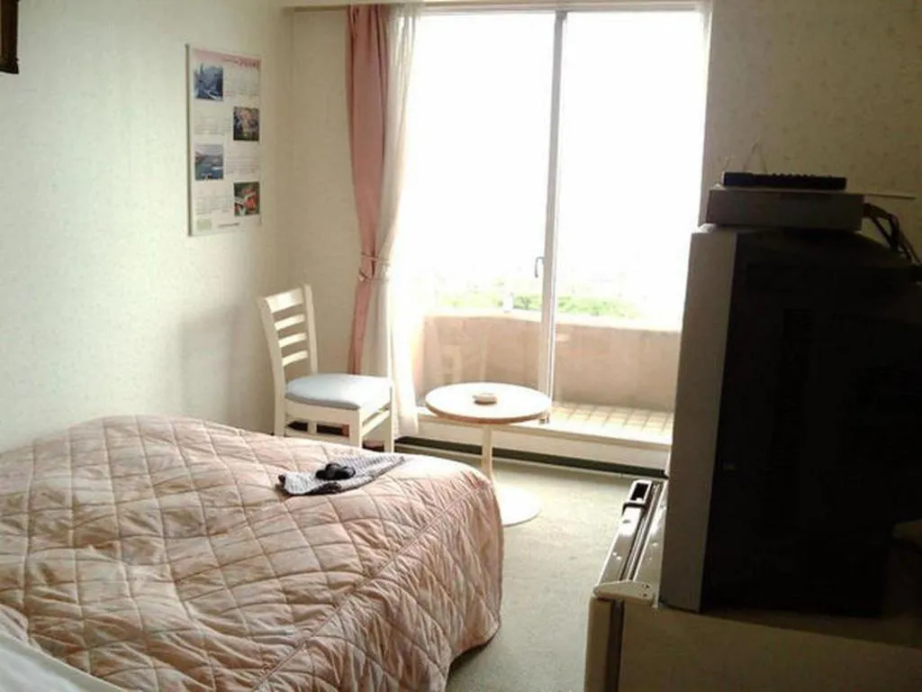 Bed in Hotel Tenchikaku