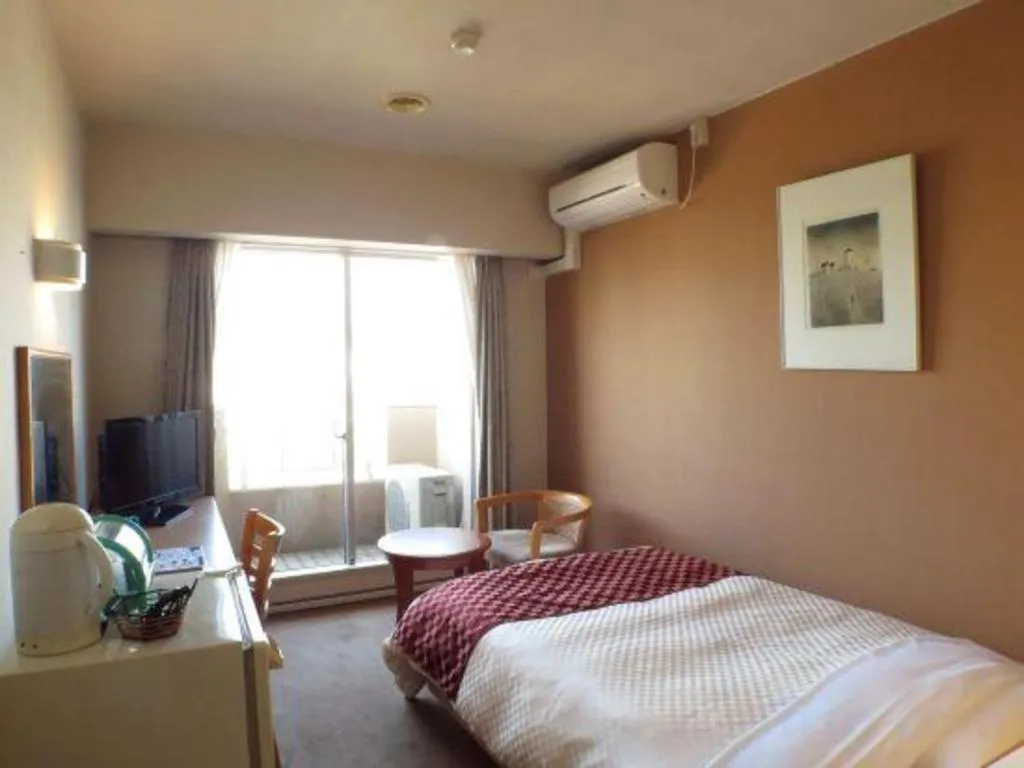 Bed in Hotel Tenchikaku