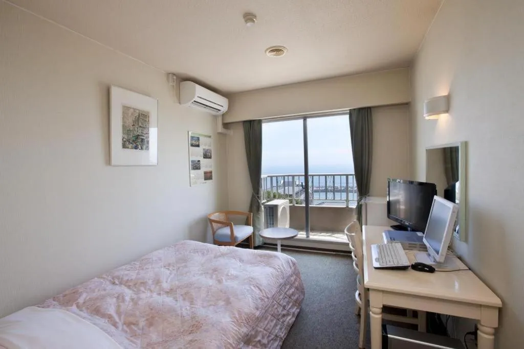 Bed in Hotel Tenchikaku