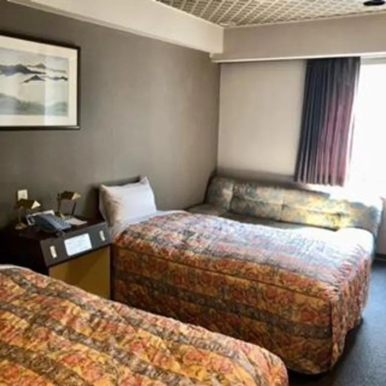 Bed in Shizuoka UI Hotel